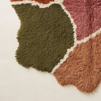 Edge and fringe detail of Talwit Azilal rug showing organic wavy outline and handwoven finish