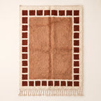 Terracotta and Ivory Beni Ourain Rug with Checkered Border – Tafat, full flat view showing geometric rust squares framing camel and cream central field
