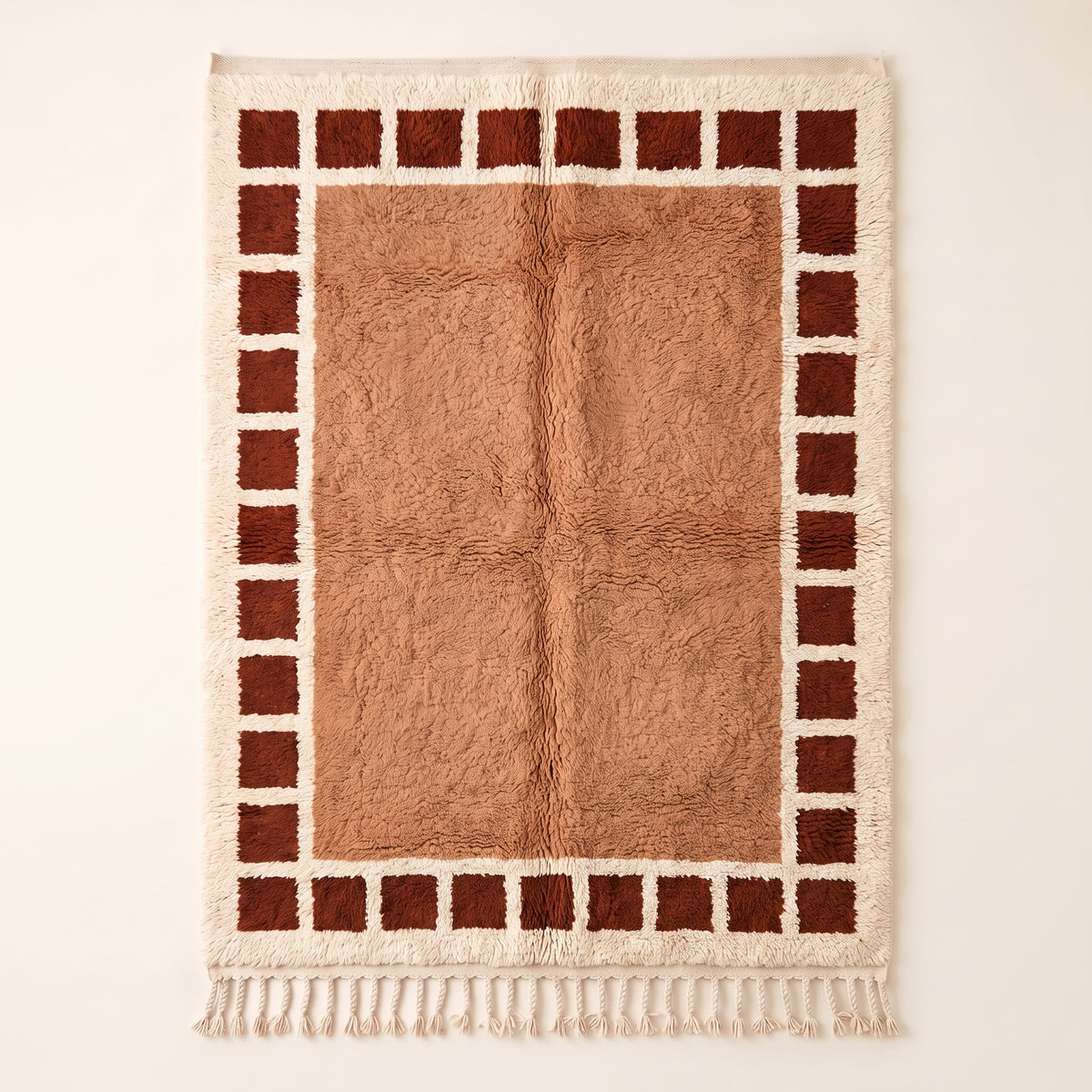 Terracotta and Ivory Beni Ourain Rug with Checkered Border – Tafat, full flat view showing geometric rust squares framing camel and cream central field