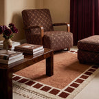 Terracotta and Ivory Beni Ourain Rug in living room with mid-century furniture and burgundy accents