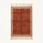 Full view of the Tislit terracotta and ivory Beni Ourain rug with a double border design and hand-tied fringe.