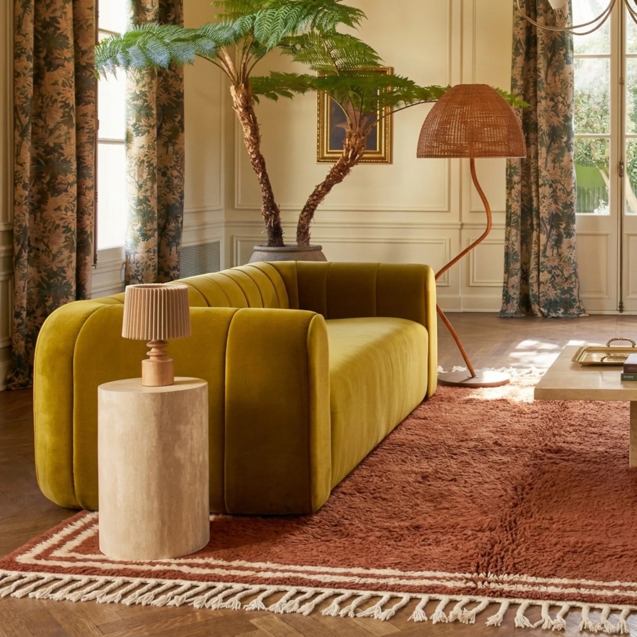 Tislit terracotta and ivory Beni Ourain rug styled in a warm contemporary living room.