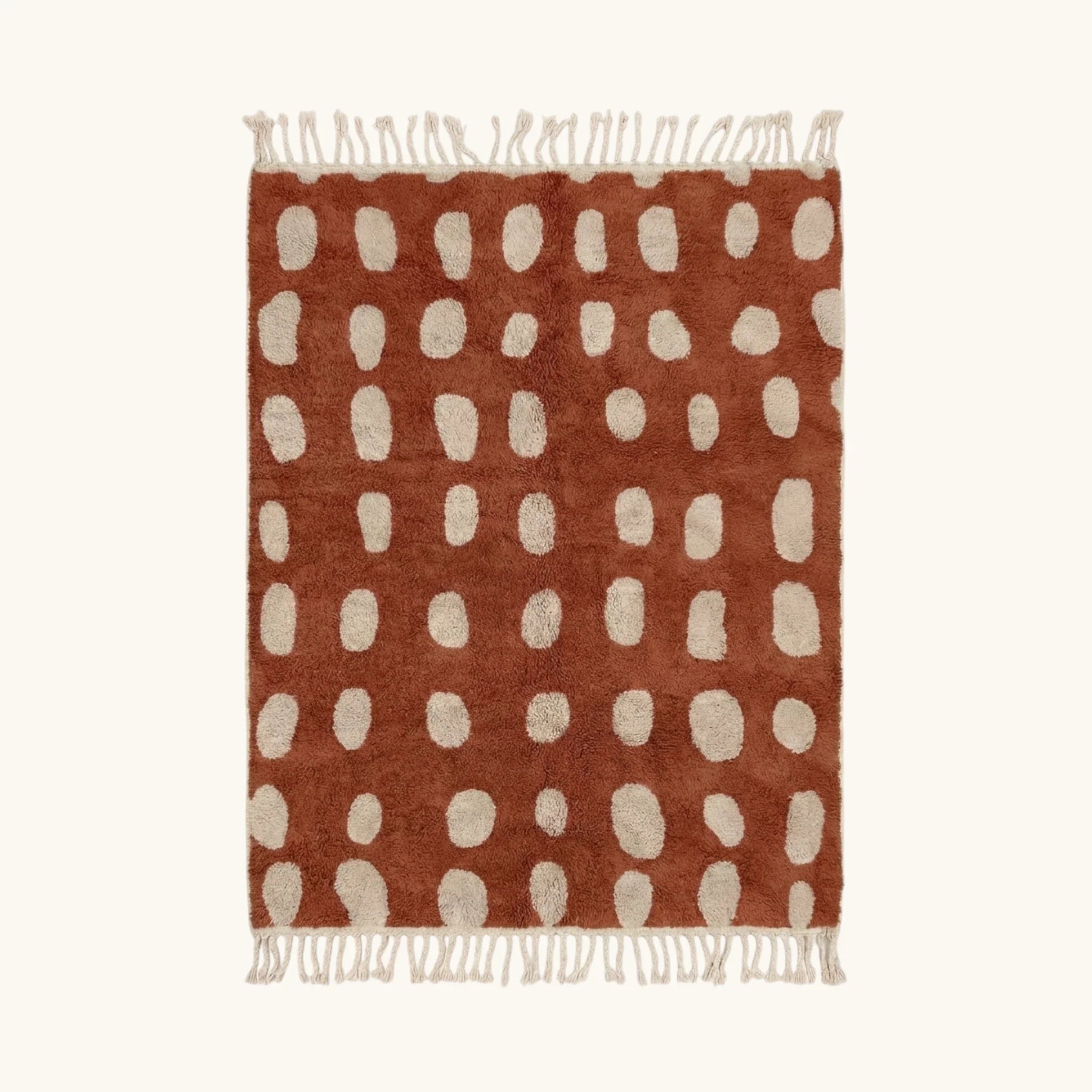 Full view of the Agdal terracotta and ivory Beni Ourain rug with an oval grid design.