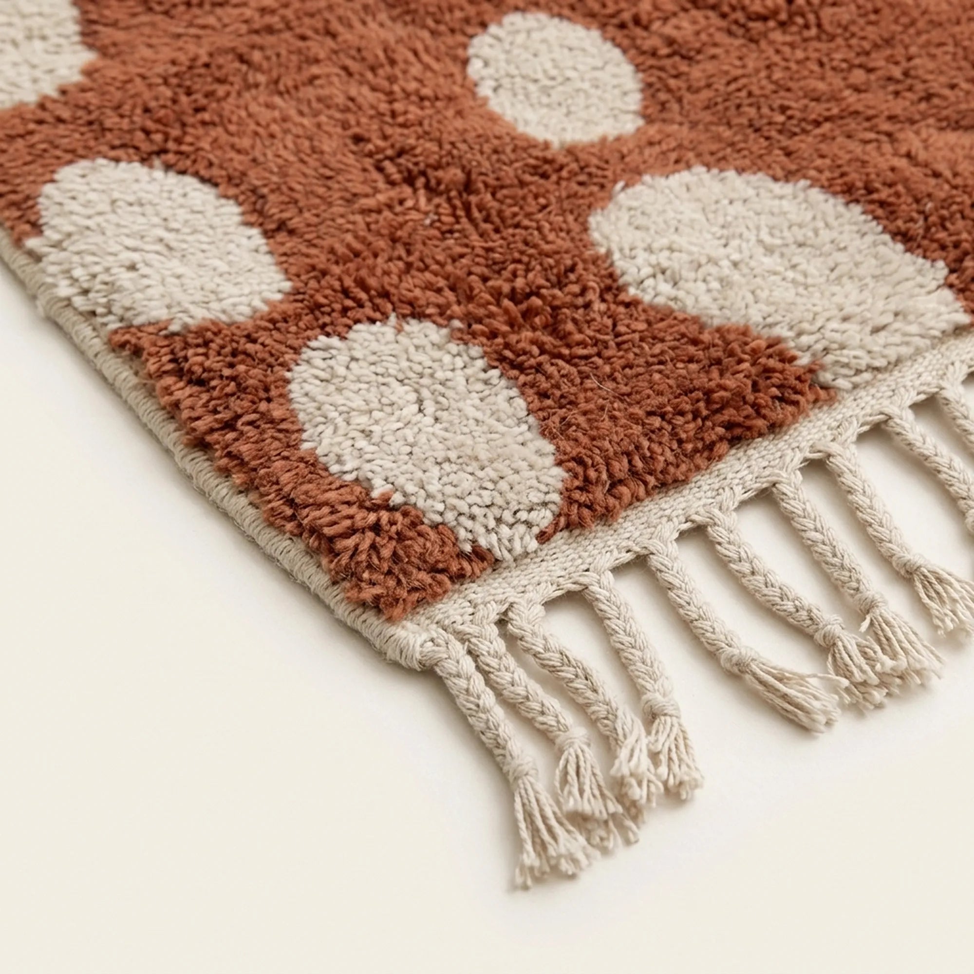 Additional detail view of the Agdal terracotta and ivory Beni Ourain rug.