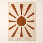 Terracotta and ivory Beni Ourain rug with sun rays motif: central circle surrounded by radiating trapezoid rays on plain background