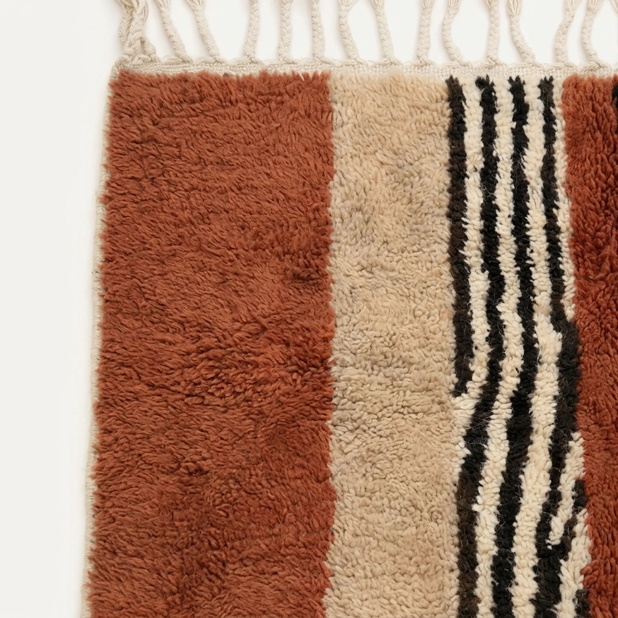 Close-up of the natural Atlas wool texture on the Azar rug.