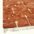 Terracotta and ivory Mrirt rug Tamurt edge texture detail