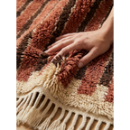 Soft hand-knotted wool texture of the Tifrit terracotta Moroccan rug.