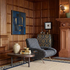 Ivory, charcoal and navy Zanafi rug Tighremt with tribal geometric border, lifestyle room view
