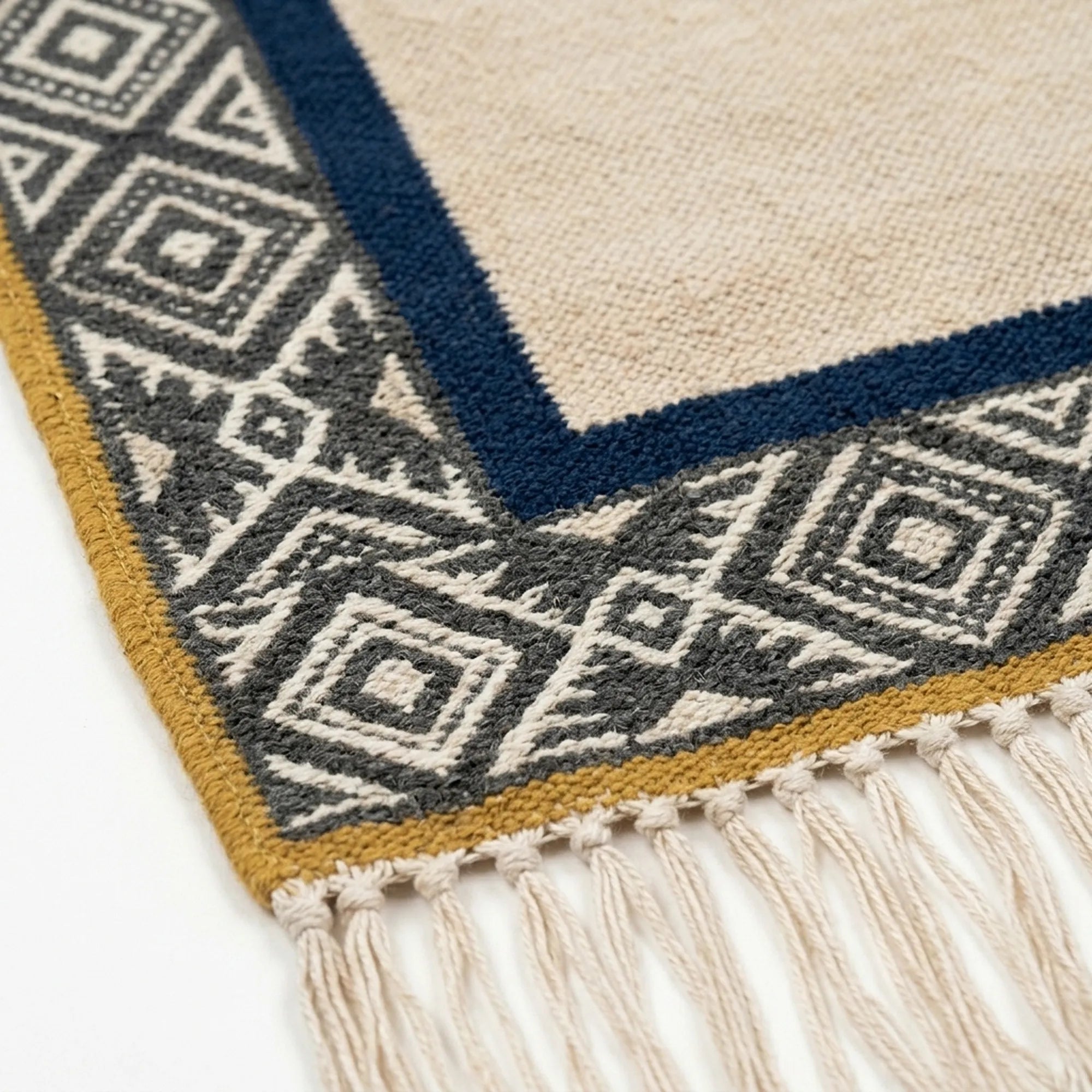 Ivory, charcoal and navy Zanafi rug Tighremt with tribal geometric border, pattern close-up