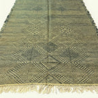 Olive Zanafi Kilim rug Tissint with linear diamond pattern, weave and border detail