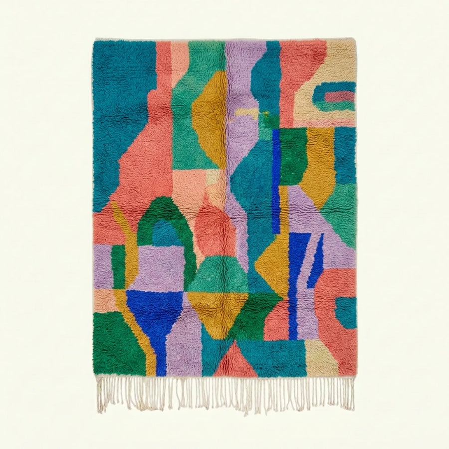 Full view of the Taziri turquoise, coral and lilac Boujaad rug with an abstract color-block design.