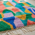 Fringe and edge detail of the Taziri turquoise Boujaad rug.