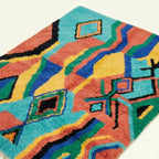 Angled view showing the pattern and wool pile of the Anir Boujaad rug.