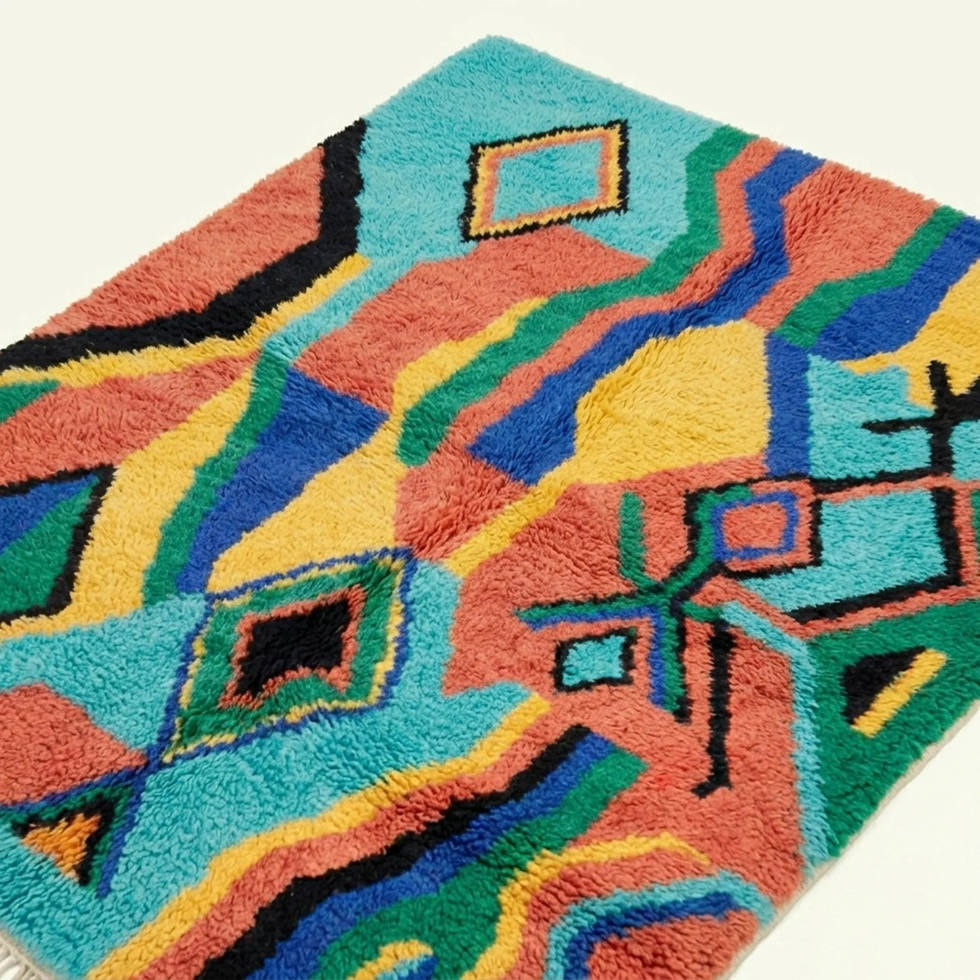 Angled view showing the pattern and wool pile of the Anir Boujaad rug.