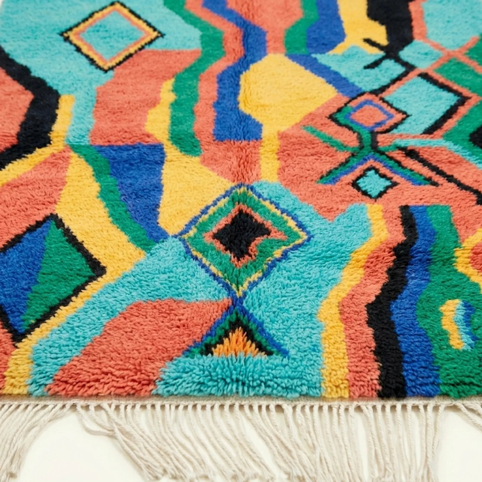 Close-up of the natural wool pile and woven texture of the Anir Boujaad rug.