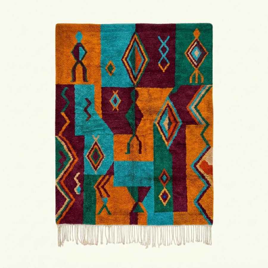 Full view of the Azru turquoise, orange and burgundy Boujaad rug with a geometric symbol patchwork design.