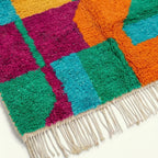 Fringe and edge detail of the Itri turquoise Boujaad rug.