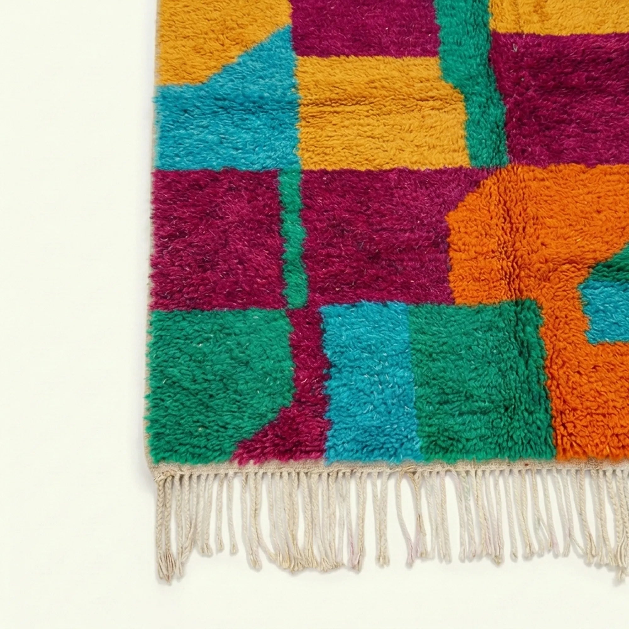 Fringe and edge detail of the Itri turquoise Boujaad rug.